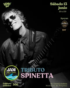 Black-and-white photo of a guitarist wearing sunglasses, smiling while playing a guitar; poster text reads 'JAM DE LA COSTA' and 'TRIBUTO SPINETTA' overlaid on the lower area.